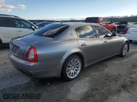 2009 Maserati Quattroporte z VIN ZAMFK39A690044644, wystawiony jako Copart lot #41343985 z przebiegiem 106 624 mil mil oraz Szkoda całkowita • Salvage title. Historia ofert i sprzedaży dostępna na DreamBid. Obrazek 3.