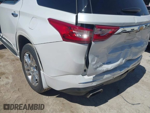 2018 Chevrolet Traverse High Country with VIN 1GNEVKKW8JJ216251, listed as a IAAI auction lot 41850824 with 85,432 mi miles and . Bid and sale history available at DreamBid. Image 6.