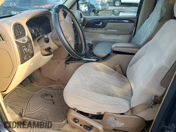 2003 GMC Envoy SLE z VIN 1GKDT13S432374541, wystawiony jako Copart lot #45757124 z przebiegiem Nie podano mil oraz Nie do naprawy • Non repairable. Historia ofert i sprzedaży dostępna na DreamBid. Obrazek 7.