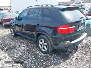 2008 BMW X5 3.0si with VIN 5UXFE43548L009495, listed as a IAAI auction lot 41694127 with 165,173 mi miles. Bid and sale history available at carsss.com. Image 3.