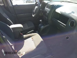 2014 Jeep Patriot Sport with VIN 1C4NJPBBXED911558, listed as a IAAI auction lot 42066449 with 107,208 mi miles. Bid and sale history available at carsss.com. Image 5.