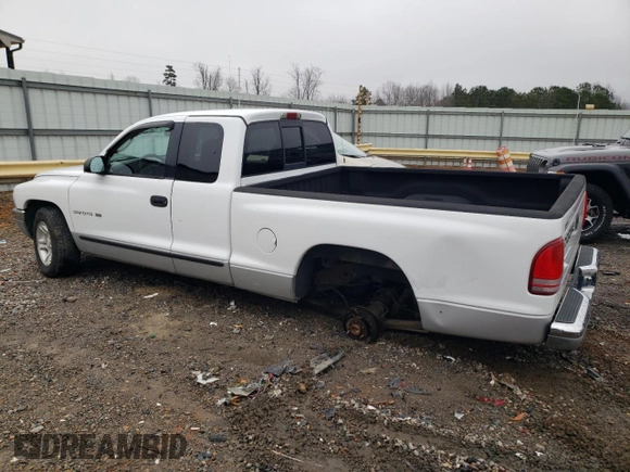 2001 Dodge Dakota Sport with VIN 1B7GL22N01S284441, listed as a Copart auction lot 83486504 with 114,613 mi miles and Salvage Title. Bid and sale history available at carsss.com. Image 2.