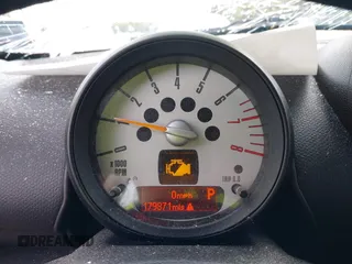 2014 MINI Countryman S with VIN WMWZC3C52EWP29433, listed as a IAAI auction lot 42179585 with 179,871 mi miles and . Bid and sale history available at DreamBid. Image 7.