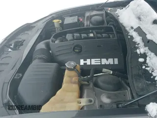 2013 Chrysler 300 S z VIN 2C3CCAJTXDH621920, wystawiony jako IAAI lot #41434113 z przebiegiem 146 164 mil mil oraz . Historia ofert i sprzedaży dostępna na DreamBid. Obrazek 19.