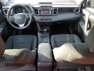 2018 Toyota RAV4 LE with VIN 2T3BFREV7JW723938, listed as a Copart auction lot 62814195 with 107,051 mi miles and Salvage title. Bid and sale history available at DreamBid. Image 8.