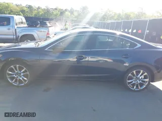 2015 Mazda Mazda6 i Grand Touring with VIN JM1GJ1W58F1182442, listed as a IAAI auction lot 41965983 with 142,000 mi miles. Bid and sale history available at carsss.com. Image 14.