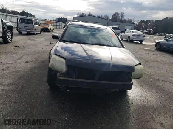 2004 Mitsubishi Galant ES z VIN 4A3AB36F34E141033, wystawiony jako Copart lot #84402814 z przebiegiem 253 403 mil mil oraz Szkoda całkowita • Salvage title. Historia ofert i sprzedaży dostępna na DreamBid. Obrazek 11.
