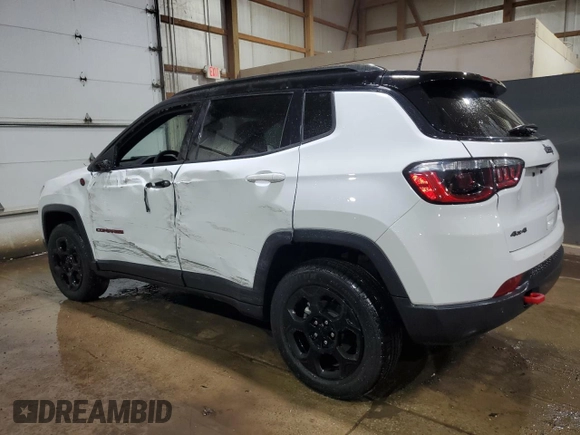 2023 Jeep Compass Trailhawk z VIN 3C4NJDDN1PT527851, wystawiony jako Copart lot #65566035 z przebiegiem 52 811 mil mil oraz Czysty tytuł • Clean title. Historia ofert i sprzedaży dostępna na DreamBid. Obrazek 2.