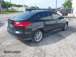2015 Ford Focus SE with VIN 1FADP3F28FL321451, listed as a IAAI auction lot 42078087 with 181,494 mi miles and . Bid and sale history available at carsss.com. Image 4.