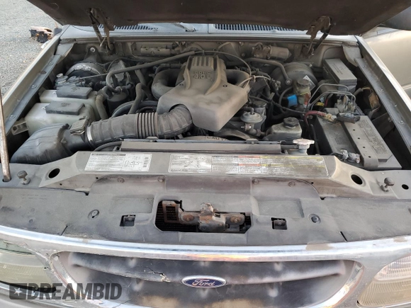 1999 Ford Explorer XLT z VIN 1FMZU32E0XZB31890, wystawiony jako Copart lot #84967184 z przebiegiem 220 424 mil mil oraz Szkoda całkowita • Salvage title. Historia ofert i sprzedaży dostępna na DreamBid. Obrazek 12.