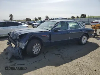 2000 Jaguar XJ with VIN SAJDA14C7YLF18873, listed as a Copart auction lot 50032495 with Not Provided miles and Salvage Title. Bid and sale history available at DreamBid. Image 1.