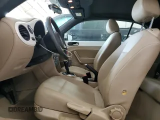2013 Volkswagen Beetle 2.5L w/Sound/Nav z VIN 3VW5P7AT7DM811619, wystawiony jako Copart lot #60331015 z przebiegiem 115 532 mil mil oraz Szkoda całkowita • Salvage title. Historia ofert i sprzedaży dostępna na DreamBid. Obrazek 7.