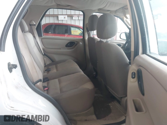 2004 Ford Escape XLS with VIN 1FMYU02134DA08567, listed as a IAAI auction lot 41872076 with 239,602 mi miles and . Bid and sale history available at DreamBid. Image 8.