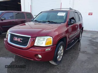 2003 GMC Envoy SLT with VIN 1GKDS13S132118361, listed as a IAAI auction lot 41909425 with 283,342 mi miles. Bid and sale history available at carsss.com. Image 2.