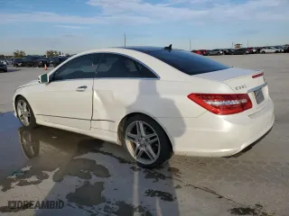 2011 Mercedes-Benz E-Class E 550 with VIN WDDKJ7CBXBF077136, listed as a Copart auction lot 83542054 with 125,274 mi miles and Salvage Title. Bid and sale history available at carsss.com. Image 2.