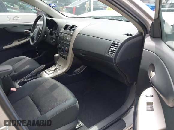 2010 Toyota Corolla with VIN 2T1BU4EE1AC480579, listed as a IAAI auction lot 42210623 with 123,795 mi miles. Bid and sale history available at carsss.com. Image 5.