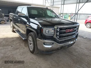 2018 GMC Sierra 1500 SLT z VIN 3GTP1NEC1JG590279, wystawiony jako IAAI lot #42255335 z przebiegiem 127 389 mil mil oraz . Historia ofert i sprzedaży dostępna na DreamBid. Obrazek 1.