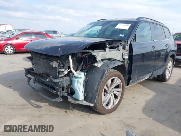 2021 Volkswagen Atlas SE z VIN 1V2HR2CA0MC543876, wystawiony jako IAAI lot #41598298 z przebiegiem 99 171 mil mil oraz . Historia ofert i sprzedaży dostępna na DreamBid. Obrazek 18.