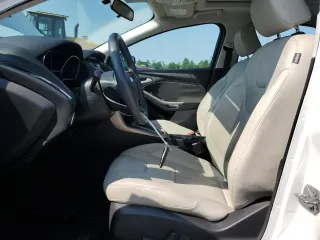 2015 Ford Focus Titanium с VIN 1FADP3N24FL214429, выставлен на аукционе Copart как лот 59159075 с пробегом 157 353 миль миль и Списание • Salvage title. История ставок и продаж доступна на DreamBid. Изображение 7.