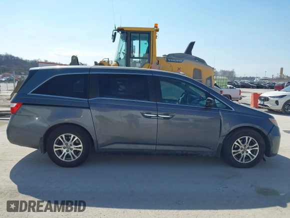 2012 Honda Odyssey EX-L with VIN 5FNRL5H69CB128585, listed as a IAAI auction lot 41695109 with 231,565 mi miles and . Bid and sale history available at carsss.com. Image 13.