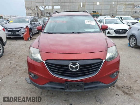 2015 Mazda CX-9 Grand Touring with VIN JM3TB2DA6F0460785, listed as a IAAI auction lot 42474705 with 62,202 mi miles and . Bid and sale history available at DreamBid. Image 12.