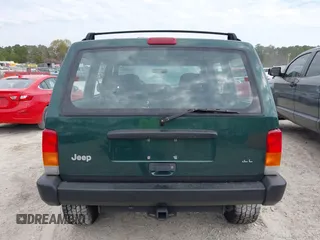 1999 Jeep Cherokee Sport with VIN 1J4FF68S1XL555463, listed as a IAAI auction lot 41898076 with 206,656 mi miles. Bid and sale history available at carsss.com. Image 16.