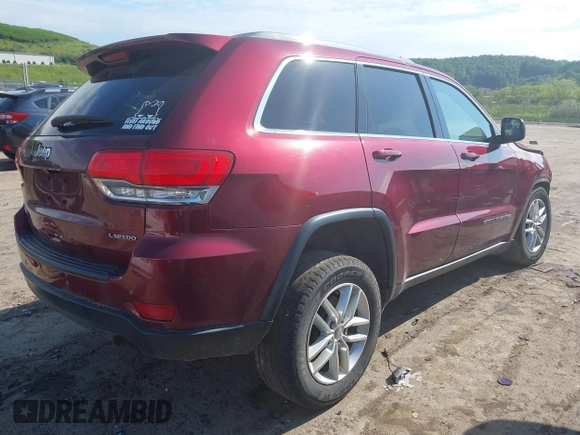 2018 Jeep Grand Cherokee Altitude with VIN 1C4RJFAGXJC280612, listed as a IAAI auction lot 42388185 with 103,305 mi miles and . Bid and sale history available at DreamBid. Image 4.