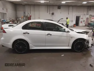 2014 Mitsubishi Lancer GT with VIN JA32U8FWXEU016230, listed as a IAAI auction lot 41379899 with 108,511 mi miles. Bid and sale history available at carsss.com. Image 13.