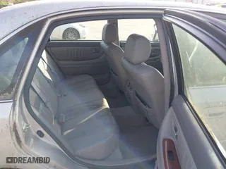 2003 Toyota Avalon XL with VIN 4T1BF28B53U302854, listed as a IAAI auction lot 42057098 with 230,127 mi miles. Bid and sale history available at carsss.com. Image 8.