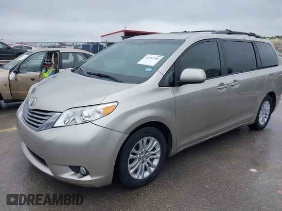 2015 Toyota Sienna XLE with VIN 5TDYK3DCXFS578888, listed as a IAAI auction lot 42187384 with 105,287 mi miles and . Bid and sale history available at DreamBid. Image 17.