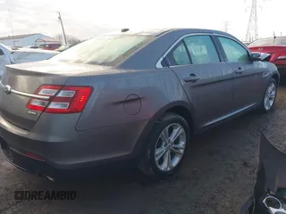 2013 Ford Taurus SEL z VIN 1FAHP2E84DG193376, wystawiony jako IAAI lot #41661721 z przebiegiem 136 341 mil mil oraz . Historia ofert i sprzedaży dostępna na DreamBid. Obrazek 4.