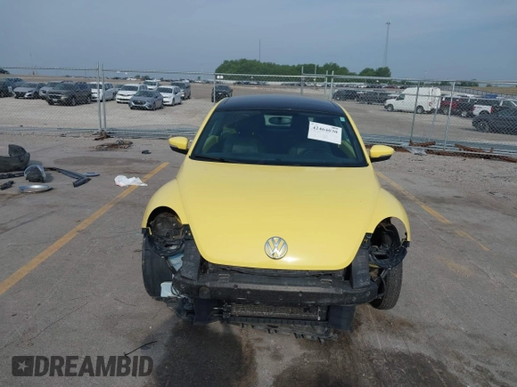 2013 Volkswagen Beetle with VIN 3VWHX7AT0DM603661, listed as a IAAI auction lot 42464030 with 95,159 mi miles and . Bid and sale history available at DreamBid. Image 13.