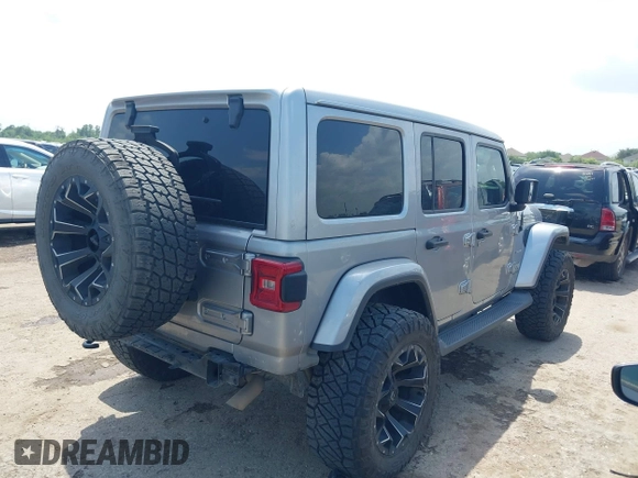 2021 Jeep Wrangler Unlimited High Altitude with VIN 1C4HJXEG3MW511185, listed as a IAAI auction lot 42125883 with 45,564 mi miles and . Bid and sale history available at DreamBid. Image 4.