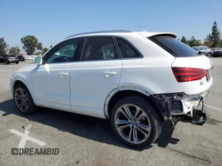 2015 Audi Q3 Premium Plus with VIN WA1BFCFS0FR001987, listed as a Copart auction lot 72962684 with 104,432 mi miles and Salvage title. Bid and sale history available at DreamBid. Image 2.