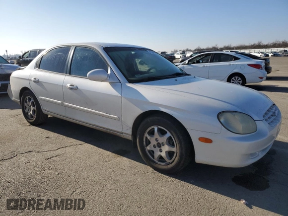 2000 Hyundai Sonata GLS with VIN KMHWF35V6YA299512, listed as a Copart auction lot 41574525 with 130,327 mi miles and Salvage Title. Bid and sale history available at carsss.com. Image 4.