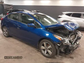 2018 Kia Forte LX z VIN 3KPFL4A71JE240123, wystawiony jako IAAI lot #41822673 z przebiegiem 258 372 mil mil oraz . Historia ofert i sprzedaży dostępna na DreamBid. Obrazek 1.