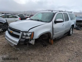 2012 Chevrolet Suburban LT with VIN 1GNSKJE7XCR174695, listed as a Copart auction lot 48224135 with 167,935 mi miles and Salvage Title. Bid and sale history available at carsss.com. Image 1.