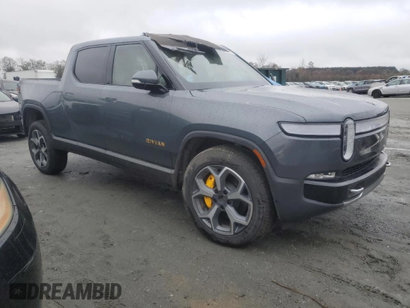2022 Rivian R1T Adventure z VIN 7FCTGAAA5NN014020, wystawiony jako Copart lot #81367764 z przebiegiem Nie podano mil oraz Szkody całkowita. Historia ofert i sprzedaży dostępna na DreamBid. Obrazek 4.