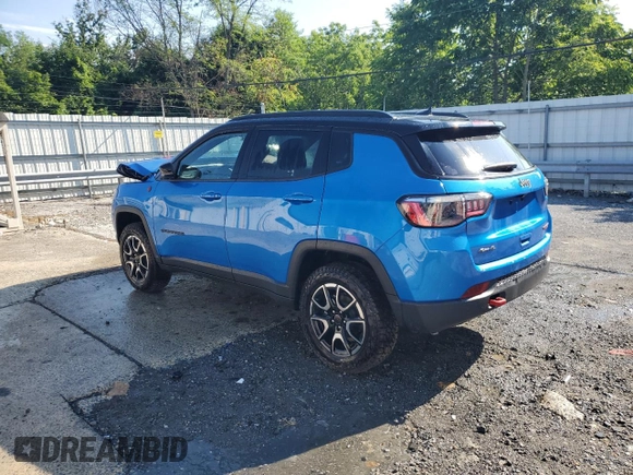 2025 Jeep Compass Trailhawk with VIN 3C4NJDDNXST556886, listed as a Copart auction lot 63569125 with 1,528 mi miles and Clean title. Bid and sale history available at DreamBid. Image 2.