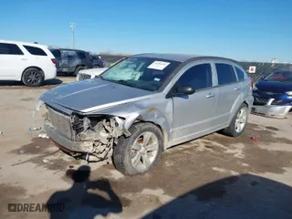 2010 Dodge Caliber SXT with VIN 1B3CB4HA4AD619143, listed as a IAAI auction lot 41694631 with 172,657 mi miles. Bid and sale history available at carsss.com. Image 2.