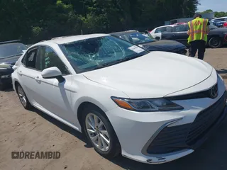2023 Toyota Camry LE z VIN 4T1C11AK0PU145781, wystawiony jako IAAI lot #42404456 z przebiegiem 53 657 mil mil oraz . Historia ofert i sprzedaży dostępna na DreamBid. Obrazek 1.