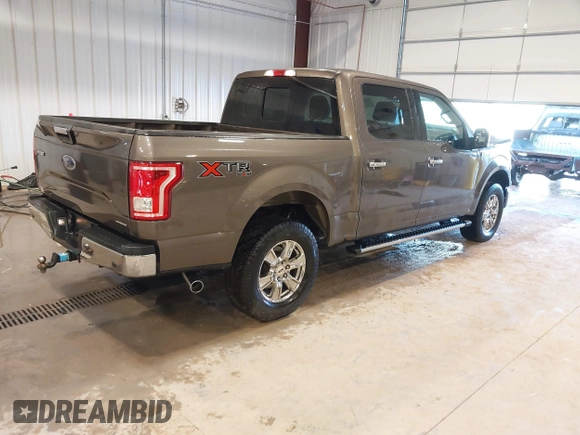 2015 Ford F-150 XLT with VIN 1FTEW1EFXFFB14990, listed as a IAAI auction lot 41681520 with 121,255 mi miles. Bid and sale history available at carsss.com. Image 4.