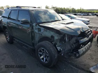 2022 Toyota 4Runner TRD Off Road Premium with VIN JTERU5JR1N6061136, listed as a Copart auction lot 57132915 with 66,783 mi miles and Salvage title. Bid and sale history available at DreamBid. Image 4.