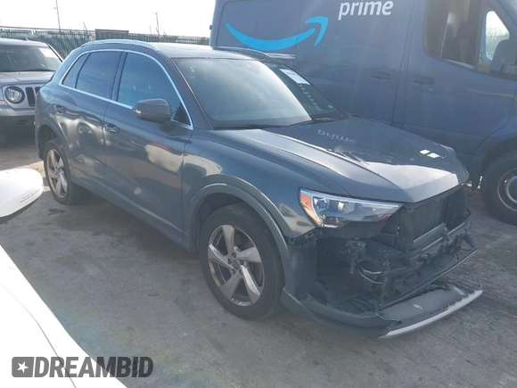 2019 Audi Q3 Premium with VIN WA1AECF34K1077065, listed as a IAAI auction lot 40826923 with 85,458 mi miles and . Bid and sale history available at DreamBid. Image 1.