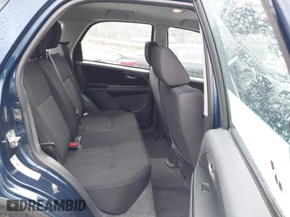 2011 Suzuki SX4 Crossover with VIN JS2YB5A31B6304110, listed as a IAAI auction lot 42023959 with 127,730 mi miles. Bid and sale history available at carsss.com. Image 8.
