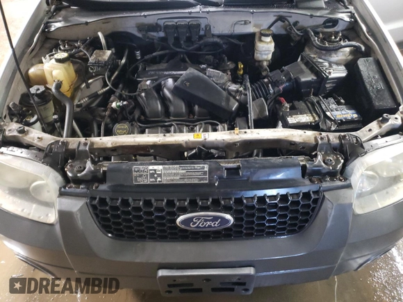 2005 Ford Escape XLT z VIN 1FMYU93145KA20050, wystawiony jako Copart lot #76794024 z przebiegiem 98 559 mil mil oraz Szkoda całkowita • Salvage title. Historia ofert i sprzedaży dostępna na DreamBid. Obrazek 11.
