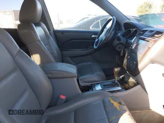 2004 Acura MDX Touring Pkg w/Navigation with VIN 2HNYD18834H511298, listed as a IAAI auction lot 41431863 with 246,274 mi miles. Bid and sale history available at carsss.com. Image 5.