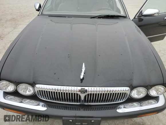 1999 Jaguar XJ z VIN SAJKD6043XC872105, wystawiony jako Copart lot #86270724 z przebiegiem Nie podano mil oraz Szkoda całkowita • Salvage title. Historia ofert i sprzedaży dostępna na DreamBid. Obrazek 12.