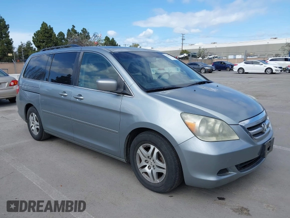 2007 Honda Odyssey EX-L with VIN 5FNRL38727B017587, listed as a IAAI auction lot 41900739 with 216,909 mi miles and . Bid and sale history available at carsss.com. Image 1.