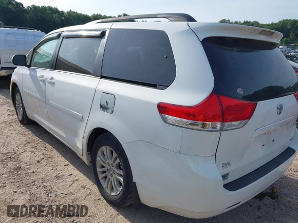 2011 Toyota Sienna XLE AAS with VIN 5TDYK3DC1BS026108, listed as a IAAI auction lot 42681177 with 201,873 mi miles and . Bid and sale history available at DreamBid. Image 3.
